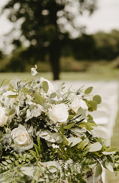 Floral bouquet displayed outside at The Eden, featuring fresh seasonal blooms