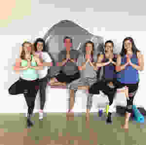 Jim Mihaly and his daughters and their friends at Yogaja Yoga Toledo