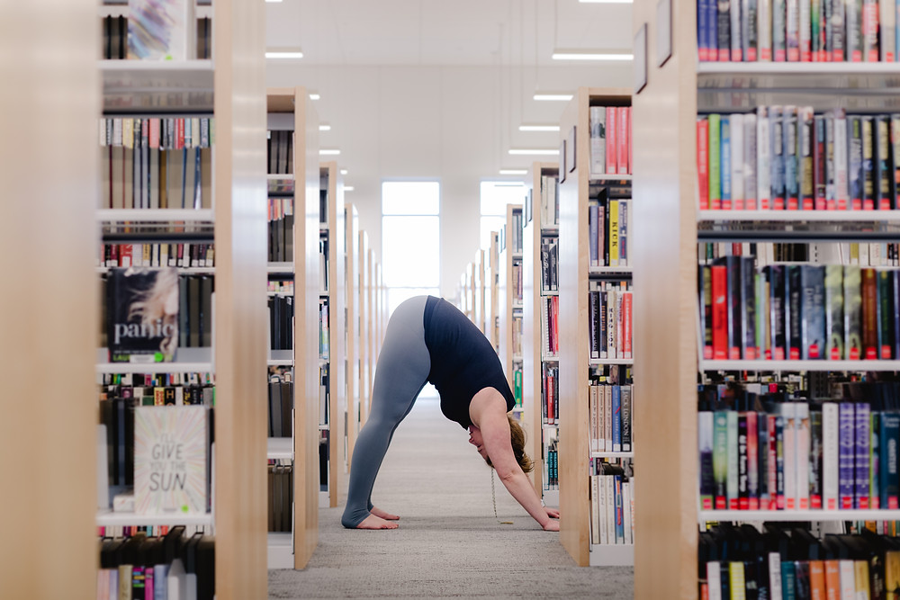 Erin Marsh in down dog at Sylvania Library