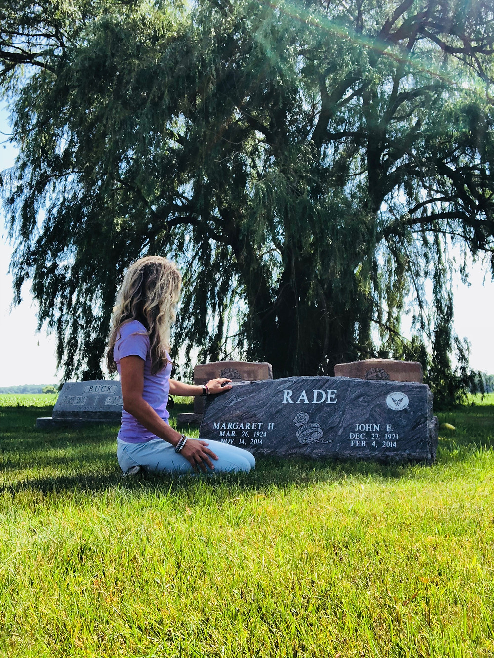 Shauna Gilsdorf visiting her grandparents at the cemetery