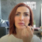 Amanda applying a glowy skin makeup look for mature skin