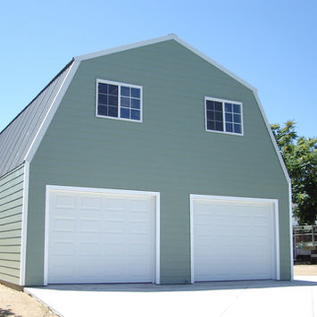 Image features a light green colored Gambrel barndominium with two white roll-up garage doors and windows.
If space is what you're after, then the Gambrel is for you!
The Gambrel's timeless design provides the most amount of space for second floors or attics, while allowing a complete open-concept layout below.
Let HERO STEEL USA help you design your Gambrel building.
At HERO STEEL USA we can make your vision a reality. Contact us for a FREE design consultation.
Call: 727-777-HERO