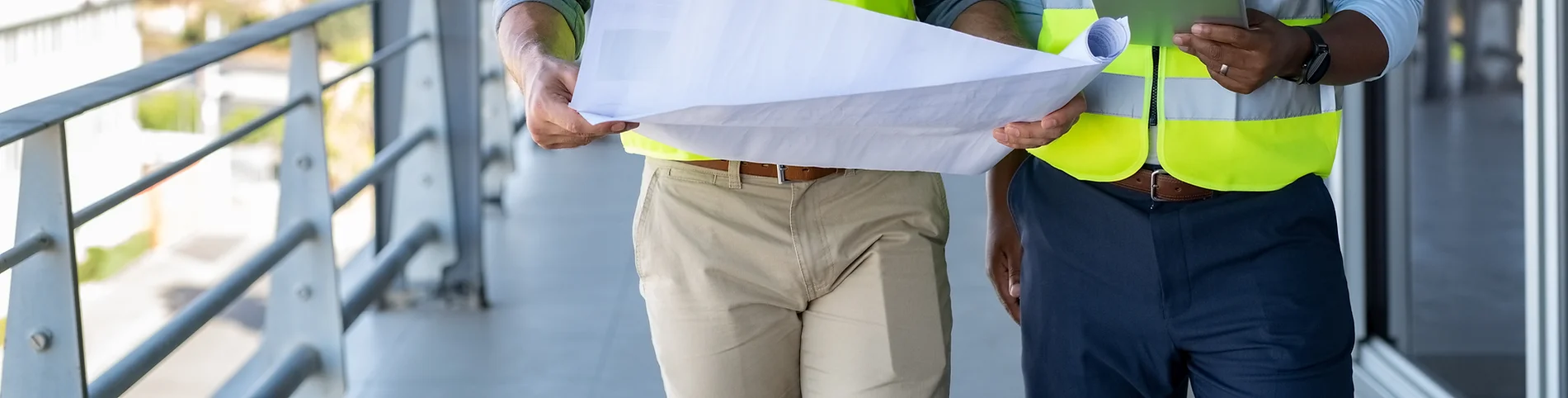 two men on construction site after health and safety elearning course