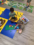 High angle view of children engaged in a hands-on learning activity