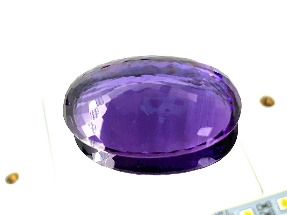Hình thu nhỏ: Natural amethyst oval gemstone
