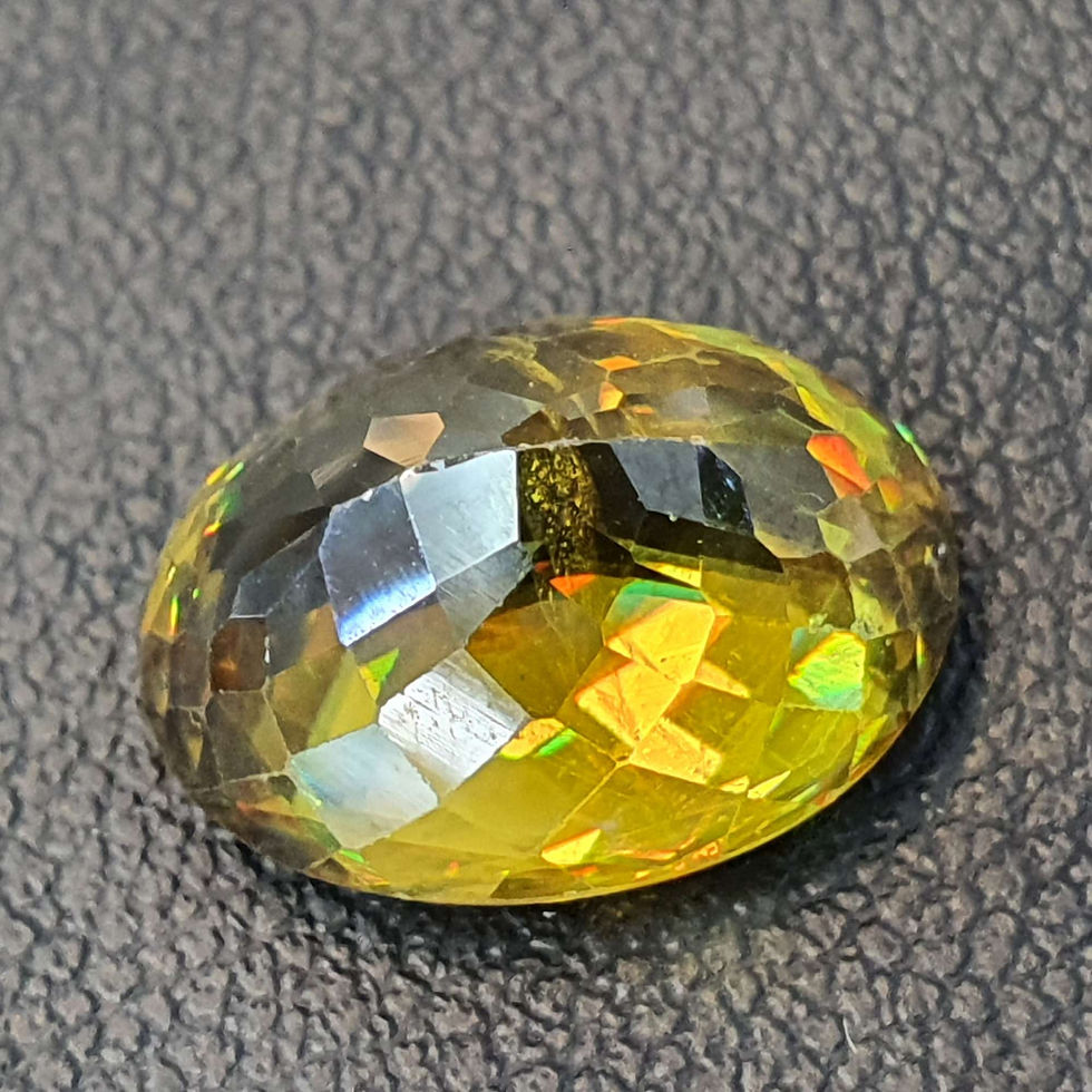 Miniatura: Natural Sphene 5.65 ct, 12.2 x 9.2, oval gemstone