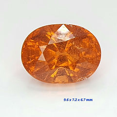 Bague en or gris 18 carats grenat spessartite de 5 carats diamants Bague en or gris 18 carats grenat spessartite de 5 carats diamants