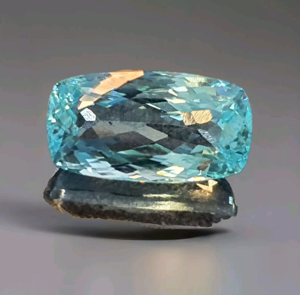 Thumbnail: Fine neon blue Paraiba tourmaline octagonal flawless clarity.