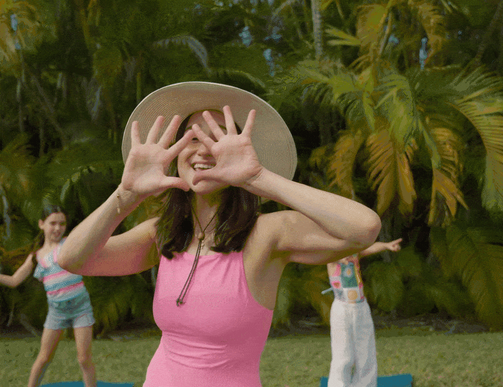 GIF of Jackie founder of Namaste & Play  singing and dancing.