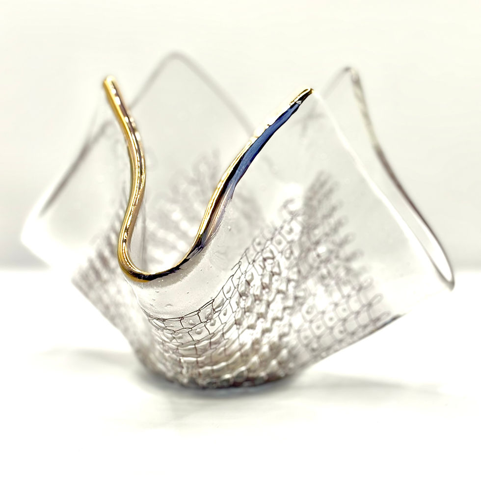 Glass ornament with copper and bronze elements