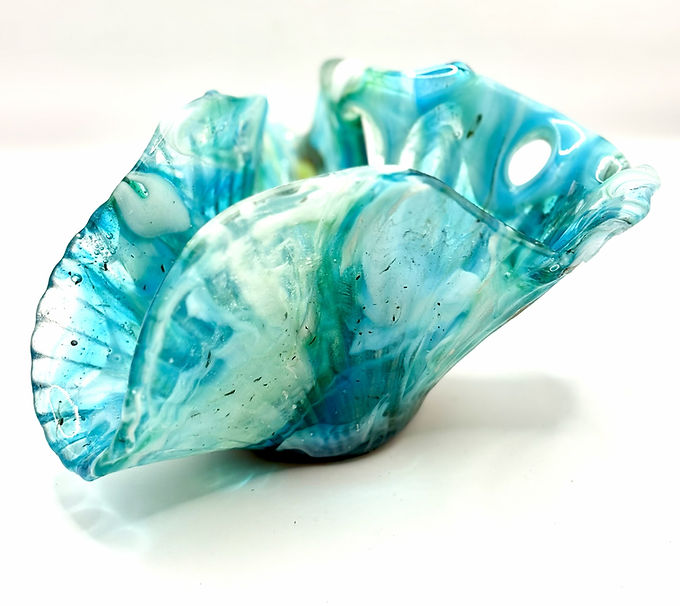 Glass in the shape of ocean weaves.jpg