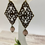 Thumbnail: Bronze and Rose Deco Dangly Earrings 