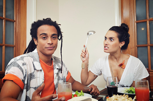 Angry Woman wanting to hit her spouse with a spoon
