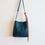 Thumbnail: All Day Bag Adjustable Crossbody Buffalo Leather Tote | Turquoise Phoenix Eyes