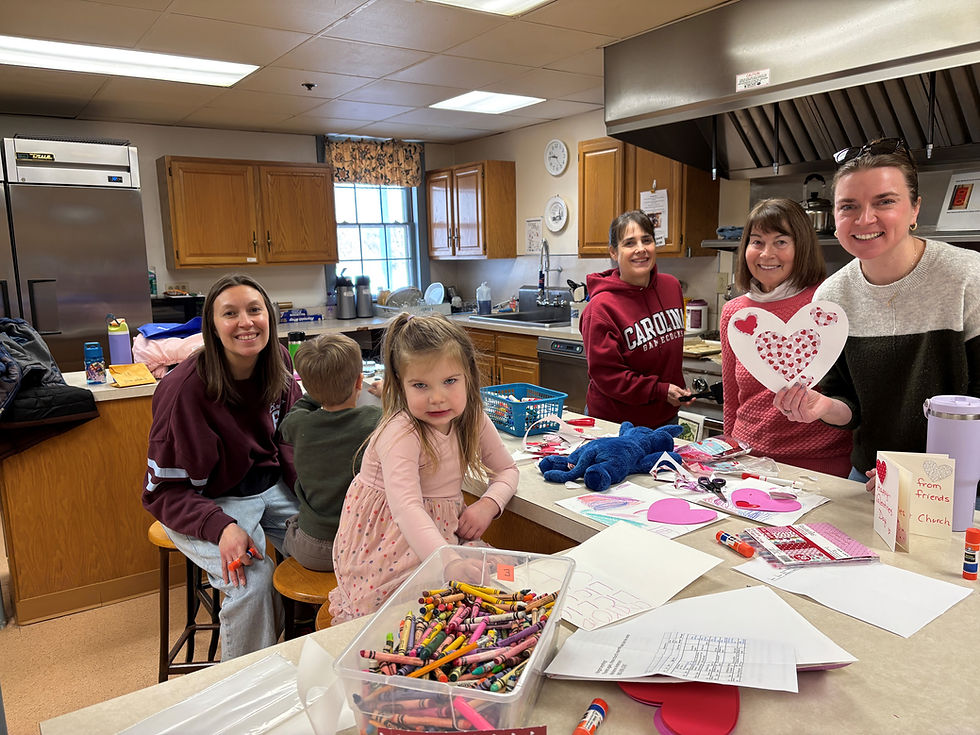 volunteers making cookies and cards
