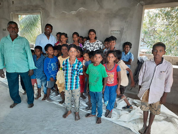 Sarah's Cottage Orphans Pastor Babu.JPG