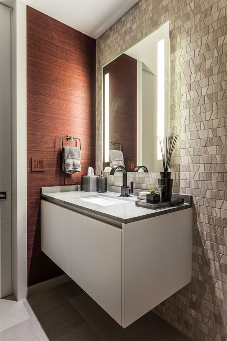 Modern bathroom vanity with illuminated mirror