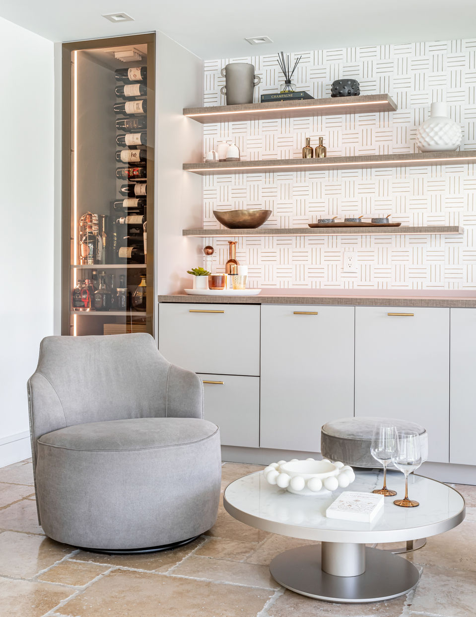 Modern bar area with wine storage and seating