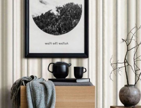 Black and white nature print, 'walk soft earth', on textured wall