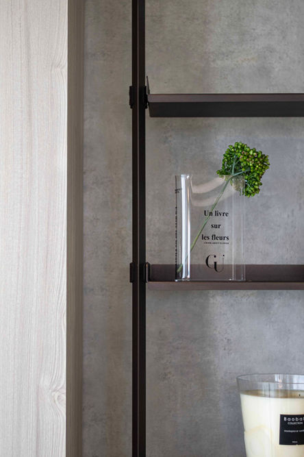 Modern black metal shelving with decor