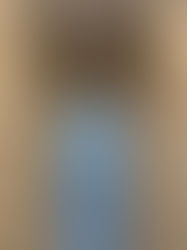 Hallway with leaf-patterned wallpaper, white door with frosted glass, black digital lock. Two ceiling lights illuminate the space.