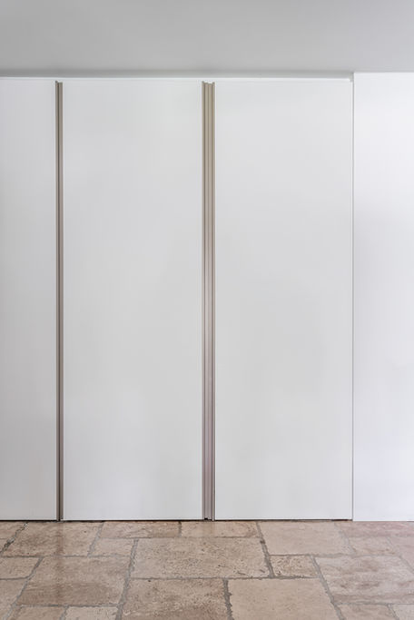 White wall with silver accents, Sunrise Harbour