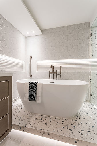 Artisan wallcovering installation showcasing expert seam alignment and precision handling of bespoke wide-width murals in a luxury South Florida residence.