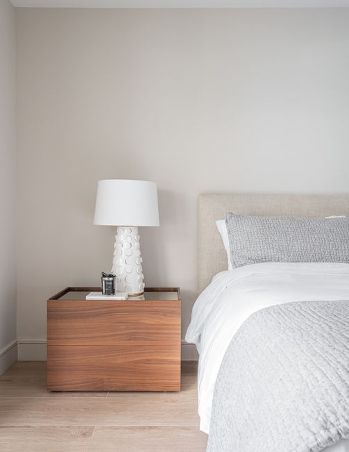 Modern bedroom with bedside lamp