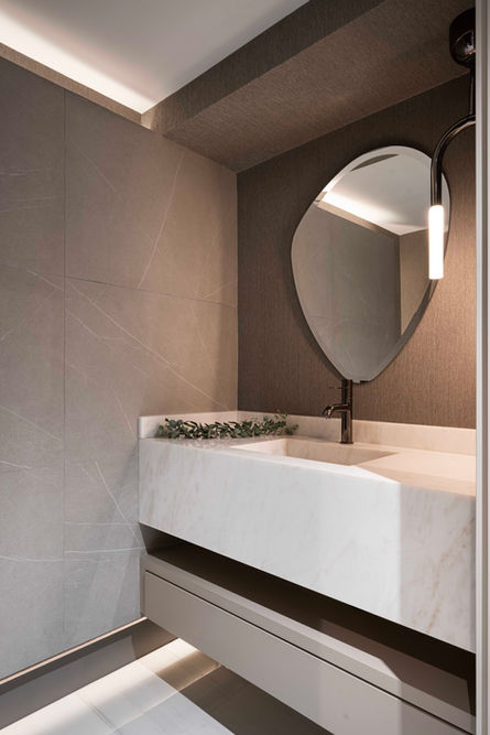 Modern bathroom design: sleek sink, unique mirror