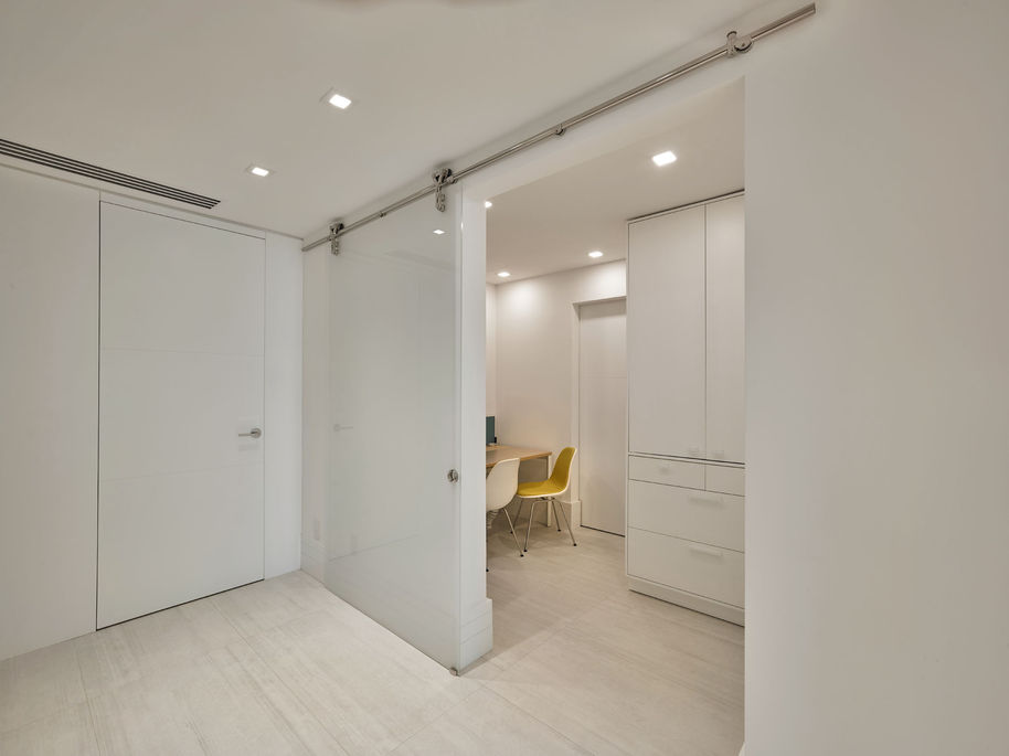 Modern glass barn door, bright interior