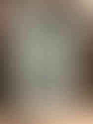 The wall hanging in multi colors, or polychrome.