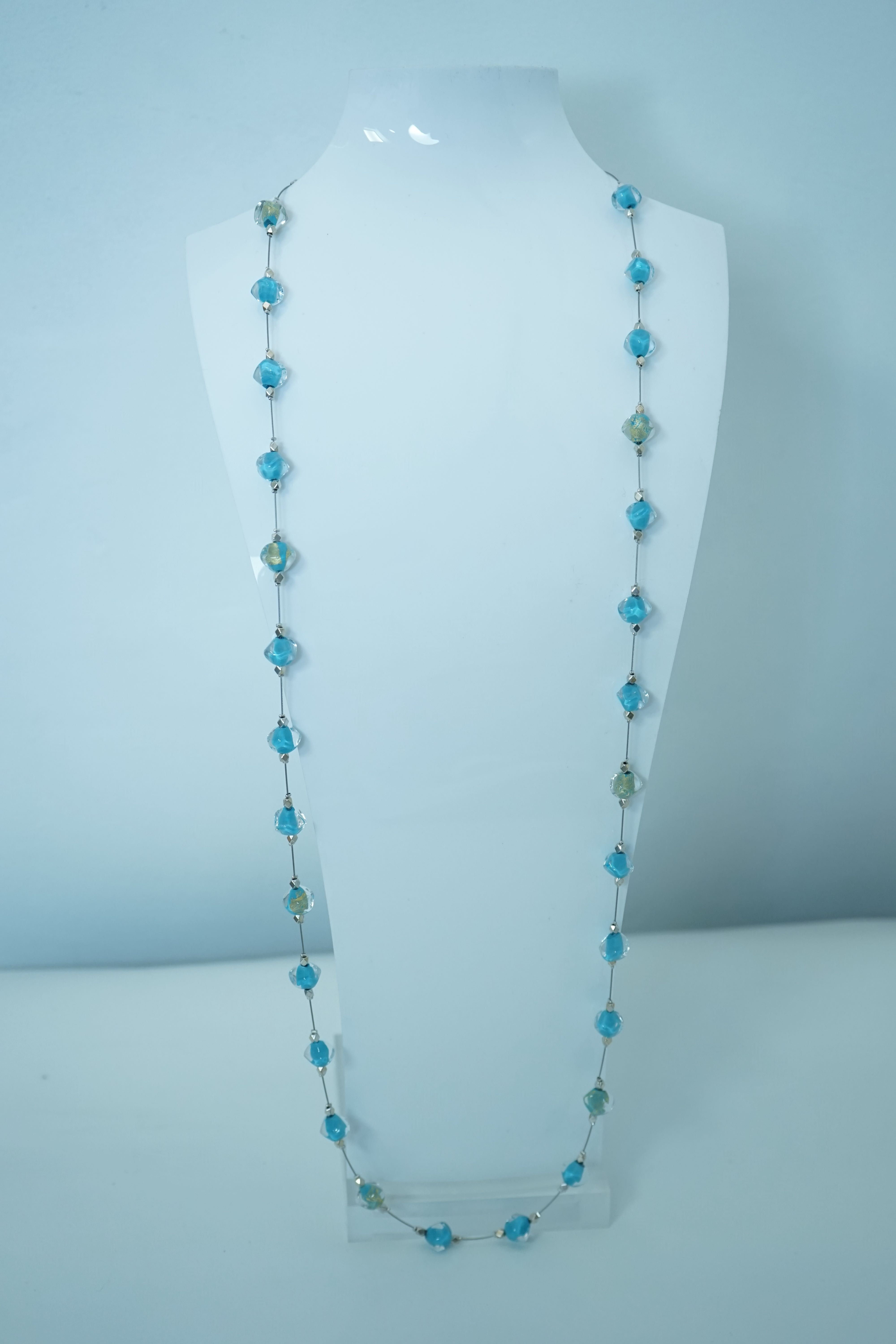 Sautoir "Sassolini" bleu clair à la feuille d'or