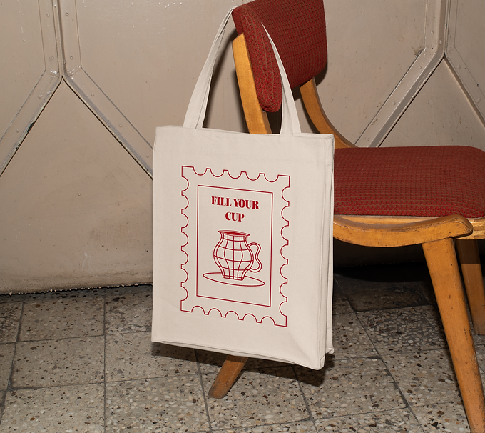 Free Canvas Bag Hanging square post on Chair Mockup2.png