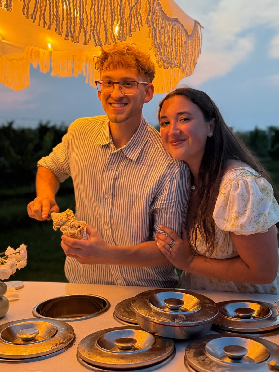 Guests scooping gelato at the cart