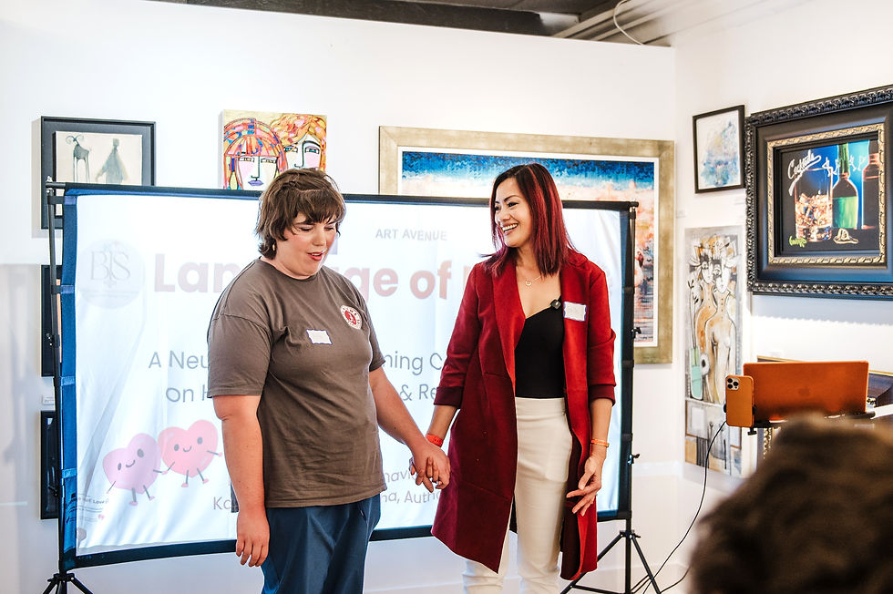 A teacher and a student holding hands