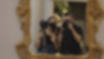 Justin and Laura waving and recording video