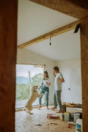 couple painting a room