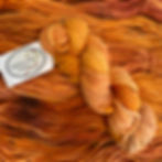 orange merino bulky yarn skein