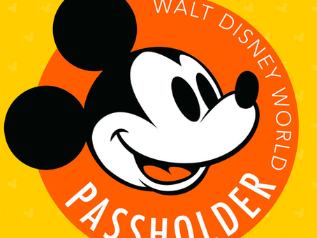 Mickey Mouse face in an orange circle with text "Walt Disney World Passholder" on a yellow background with small Mickey icons.