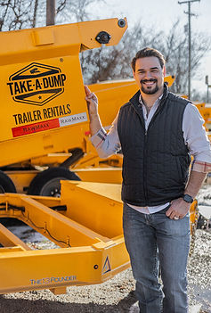 Owner of Take-A-Dump with a dump trailer
