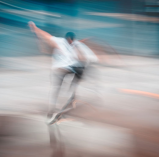 A vibrant fine art wall art abstract ICM photography photo print of skateboarder in motion in Oslo city by Douglas Carr Photography is perfect every wall or collector a like and is for sale taken with Fuji GFX100Sii
