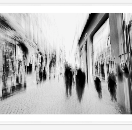 A stream of faceless figures dissolves into light and shadow on Kongens gate, Oslo’s historic shopping street. This monochrome artwork transforms busy shoppers into drifting silhouettes—wandering souls caught between clarity and blur. This artwork blurs the line between physical presence and emotional absence, inviting viewers to reflect on the anonymity of crowds and the shared solitude of city life. A Limited Edition Digital Graphic Artwork by Douglas Carr pulses with urban solitude in the series