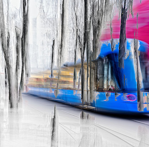 A vivid blue tram emerges from a monochrome forest, its form fusing with shadowy trees as if colour itself were breaking through. Behind it, a glowing purple façade clings close—an urban spectre awakened by motion.