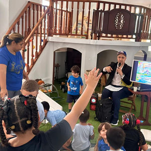 Children participating in a Coquichy Adventures reading event at Casa Rosa in Old San Juan