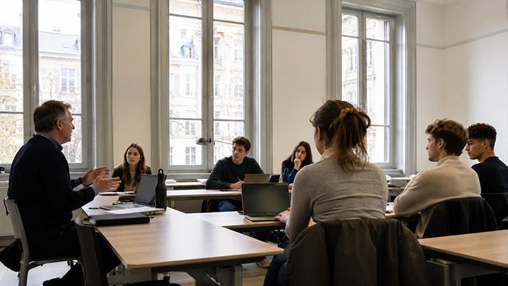 International students in a European university classroom during an English-taught Bachelor’s program.