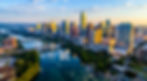 Austin Texas USA sunrise skyline cityscape over Town Lake or Lady Bird Lake with amazing r