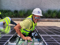 one of our Nepoworx alumni installing a solar panel during our Solar PV Greencard Training