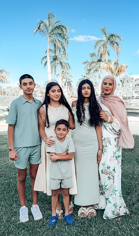 Inaam Itani Edmonton travel creator and influencer consultant with her family