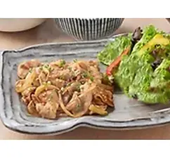 Savory pork stir-fry with side salad