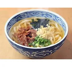 Steaming bowl of udon noodles